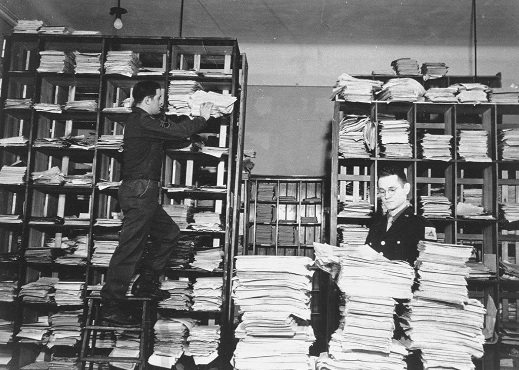American army staffers organize stacks of German documents that were collected by war crimes investigators as evidence for the International Military Tribunal trial of war criminals at Nuremberg. United States Holocaust Memorial Museum, courtesy of National Archives and Records Administration, College Park