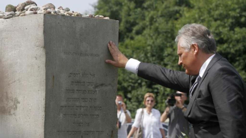 Former Polish President Alekdander Kwasniewski attends a memorial to the Jedwabne massacre in July 2011. Credit: AP 