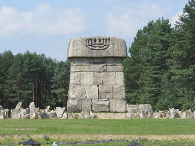 The large memorial rock at the centre where the crematorium once stood. 