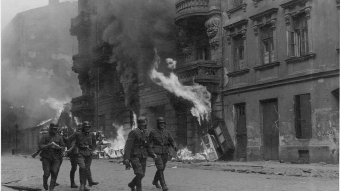 German Nazi SS men on the Nowolipie street of Warsaw Ghetto during the uprising, 1943. Credit: National archives catalog 